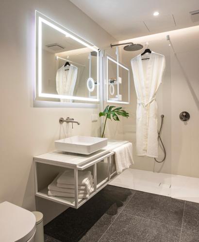 Ein Badezimmer in der Unterkunft Hotel 1231