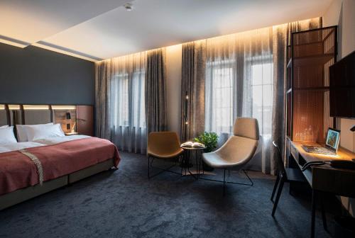 Ein Bett oder Betten in einem Zimmer der Unterkunft Hotel 1231