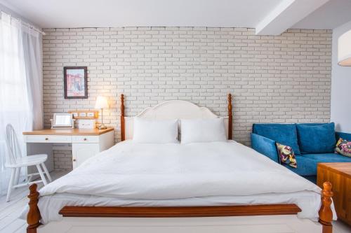 Cama o camas de una habitación en 4 Design Inn