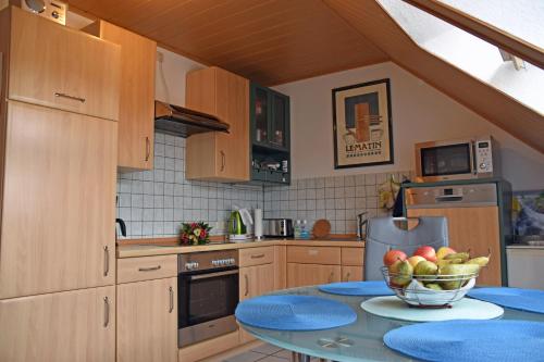 Η κουζίνα ή μικρή κουζίνα στο Ferienwohnung Uchte