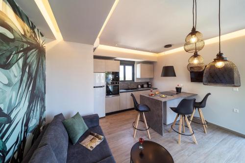 Η κουζίνα ή μικρή κουζίνα στο Palmeral Luxury Suites