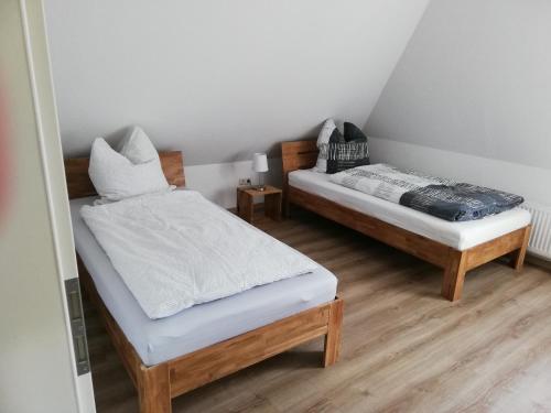 Katil atau katil-katil dalam bilik di Etzel-Lodge Weideblick