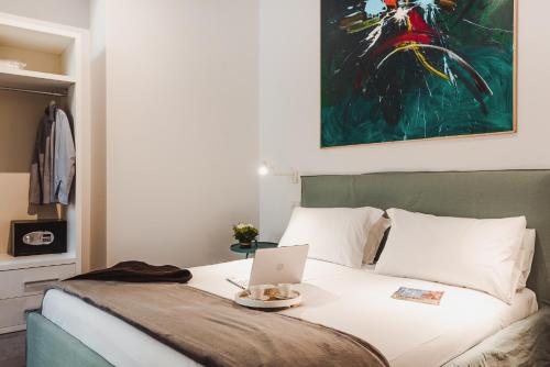 Cama ou camas em um quarto em Nikis Collection Navona