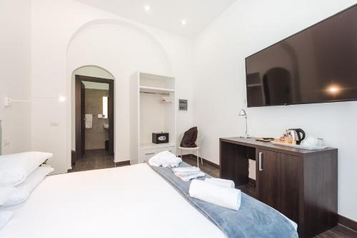 Cama ou camas em um quarto em Nikis Collection Navona