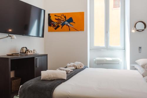 Cama ou camas em um quarto em Nikis Collection Navona