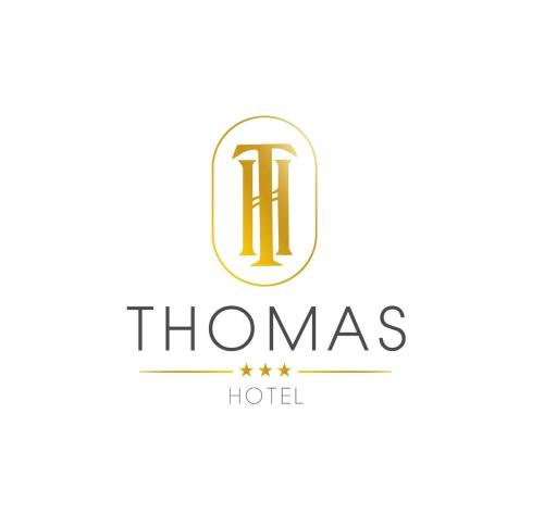 a logo for h homes hotel at Thomas Hotel Budapest in Budapest