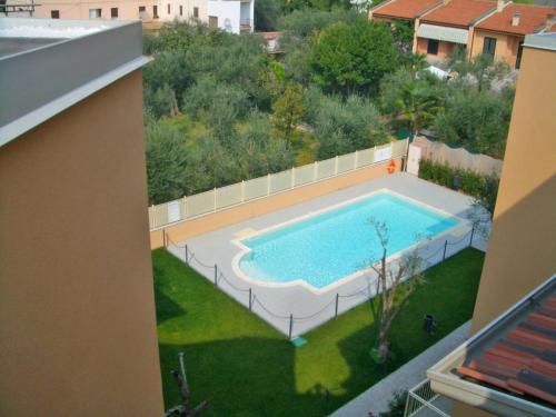 an overhead view of a swimming pool in a yard at Apartment Il Piccolo by Interhome in Toscolano Maderno