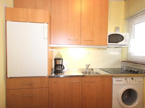 A kitchen or kitchenette at Apartment Am Birkenhain-8 by Interhome