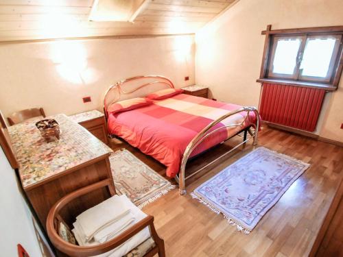 Ένα ή περισσότερα κρεβάτια σε δωμάτιο στο Apartment Santa Lucia-1 by Interhome