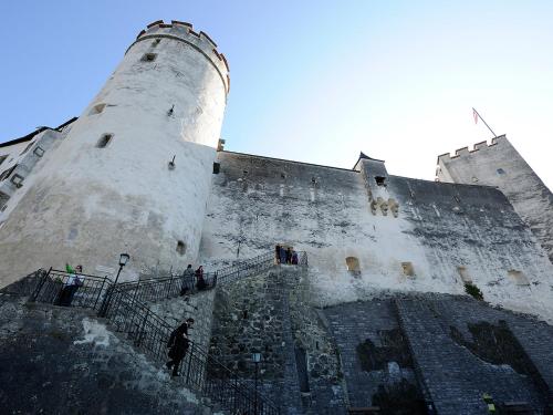 a group of people standing outside of a castle at Apartment Eckel-1 by Interhome in Russbach