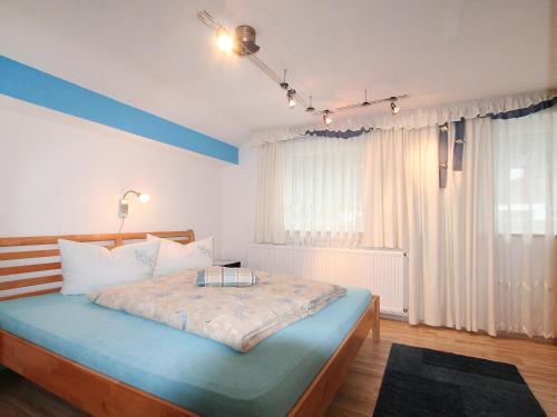 Katil atau katil-katil dalam bilik di Apartment Dias by Interhome