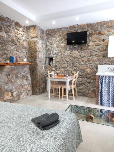 TV a/nebo společenská místnost v ubytování Cortile delle mura