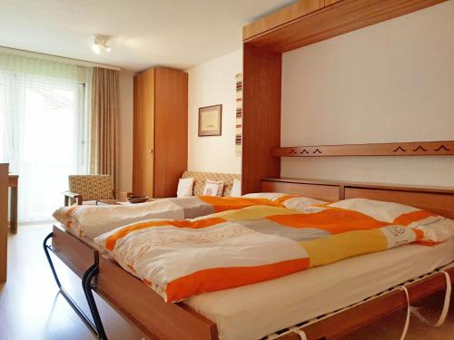 Ліжко або ліжка в номері Apartment Castor und Pollux-1 by Interhome