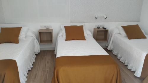 Cama o camas de una habitación en PortoSantiago
