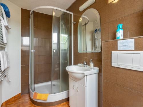 a bathroom with a shower and a sink at Holiday Home Haus Polivka by Interhome in Třebíšov