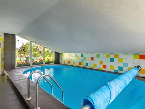 a pool in a hotel room with a swimming pool at Holiday Home Haus Polivka by Interhome in Třebíšov