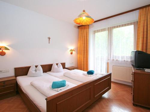 Lova arba lovos apgyvendinimo įstaigoje Apartment Gasteighof-5 by Interhome