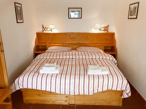 Ένα ή περισσότερα κρεβάτια σε δωμάτιο στο Studio Terrasse des Alpes-9 by Interhome