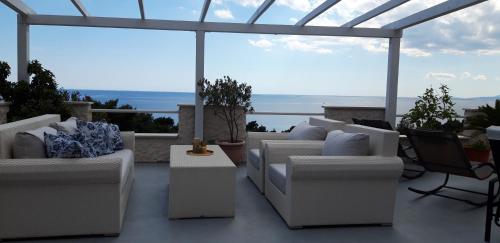 Khu vực ghế ngồi tại Apartments Dobrila