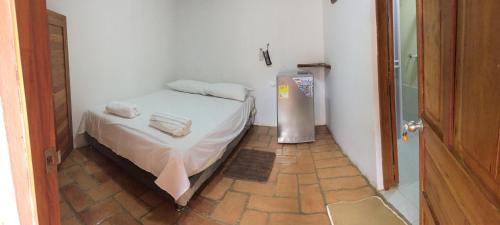 Giường trong phòng chung tại LA CHOZA