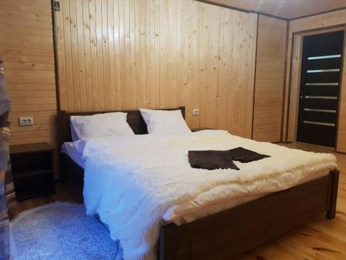 Ένα ή περισσότερα κρεβάτια σε δωμάτιο στο Family