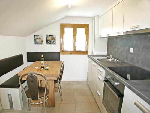 Kuchyň nebo kuchyňský kout v ubytování Apartment Bergfink-1 by Interhome