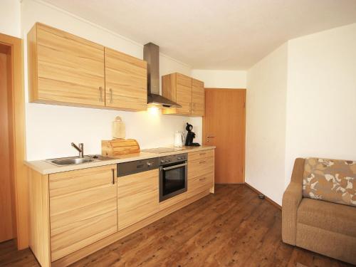 Kuchyň nebo kuchyňský kout v ubytování Apartment Christian by Interhome