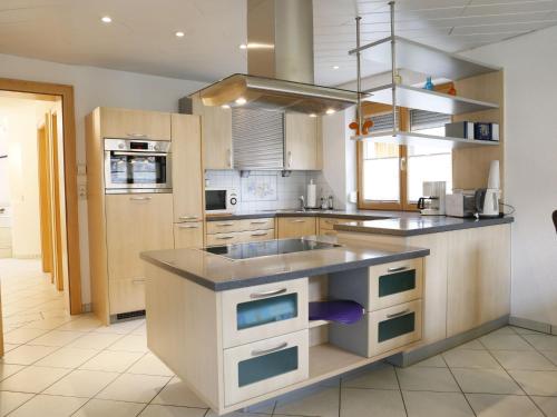 A kitchen or kitchenette at Holiday Home Heidi by Interhome
