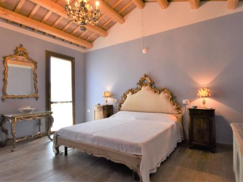 Posteľ alebo postele v izbe v ubytovaní Holiday Home Azienda Agricola Forzello-1 by Interhome