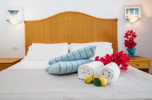 Postel nebo postele na pokoji v ubytování Hotel Rojas