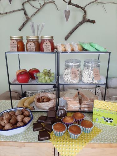 a table topped with lots of different types of food at cà bianca in Latisana