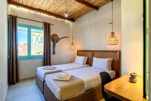 Ένα ή περισσότερα κρεβάτια σε δωμάτιο στο Ilias Apartments 