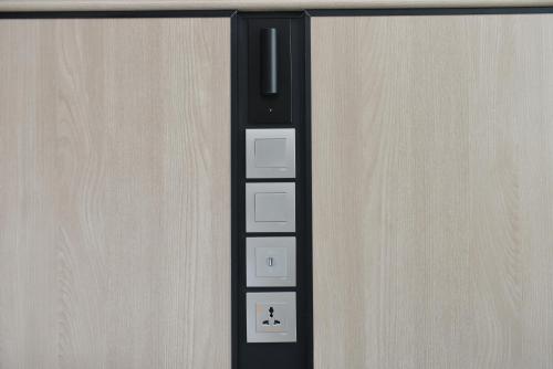 a close up of a door with a drawer at Centre Point Hotel Terminal21 Korat in Nakhon Ratchasima