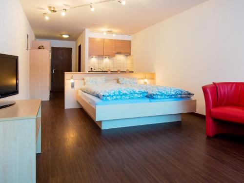 Ένα ή περισσότερα κρεβάτια σε δωμάτιο στο Apartment Amici-2 by Interhome