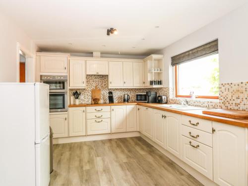 Una cocina o zona de cocina en Tombeck