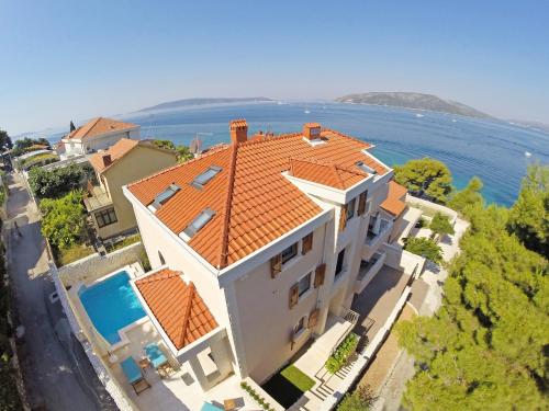 an aerial view of a large white house with a red roof at Holiday Home Villa Mustra by Interhome in Okrug Donji