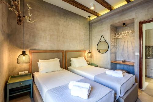 Ένα ή περισσότερα κρεβάτια σε δωμάτιο στο Ilias Apartments 