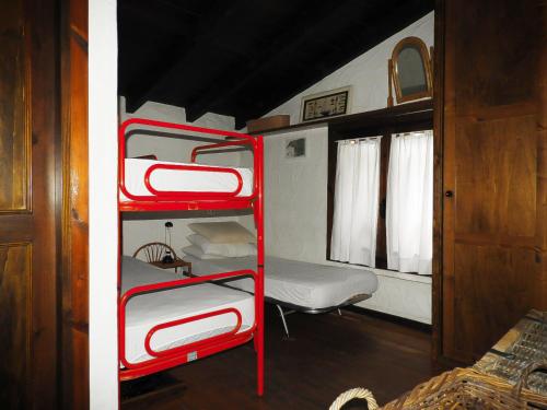 Palanda nebo palandy na pokoji v ubytování Casa Costa Corallina Mare