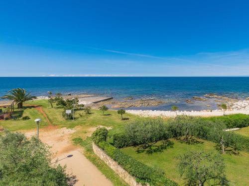 an aerial view of a beach with the ocean at Apartment Mira-3 by Interhome in Umag