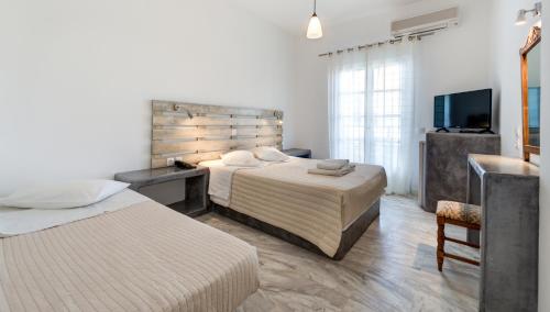 Postel nebo postele na pokoji v ubytování HOTEL MOHITERO