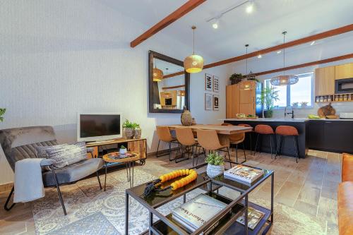 a living room with a couch and a table at Carregado House close to Lisbon in Carregado