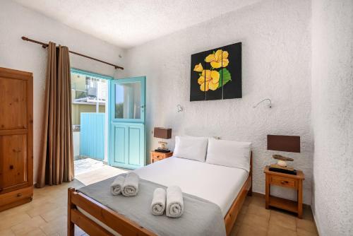 Postel nebo postele na pokoji v ubytování Ilias Apartments