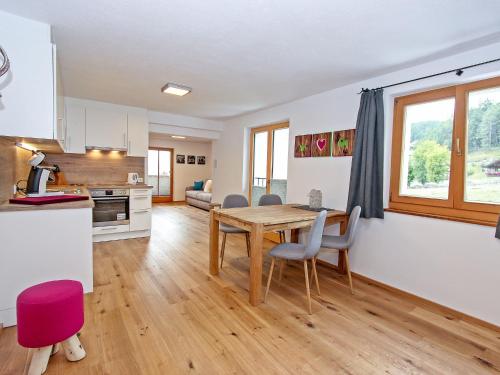 A kitchen or kitchenette at Apartment Renauer by Interhome