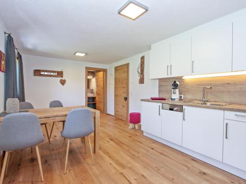 A kitchen or kitchenette at Apartment Renauer by Interhome