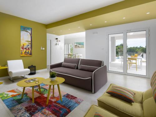 Posezení v ubytování Villa Debora by Interhome