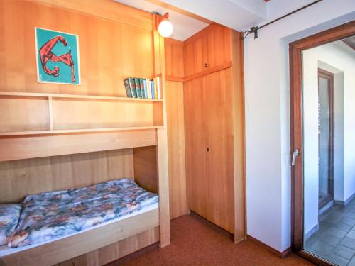a bedroom with a bunk bed in a room at Holiday Home Berghaus Weitblick by Interhome in Ramsau am Dachstein