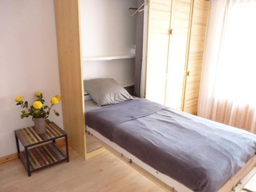 En eller flere senger på et rom på Apartment Les sources 4209 by Interhome