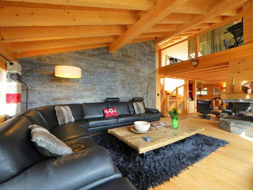 A seating area at Chalet Chalet Maurice by Interhome