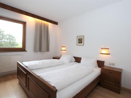 Кровать или кровати в номере Apartment Römerhof-2 by Interhome