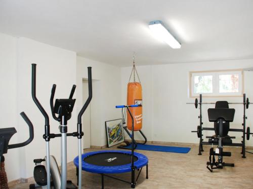 a gym with exercise equipment in a room at Apartment Poolside by Interhome in Castro